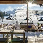 Holzhotel Forsthofalm 4* לאוגנג